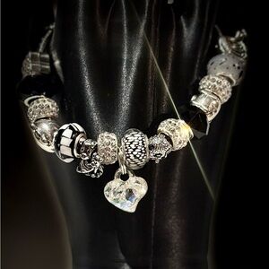 Elegant Silver and Black Animal Charm Bracelet